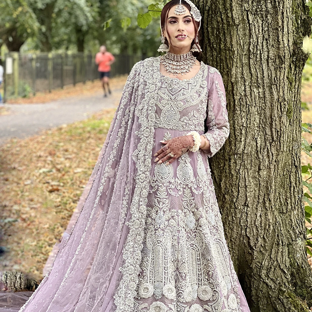 Bride with dupatta placed over shoulder