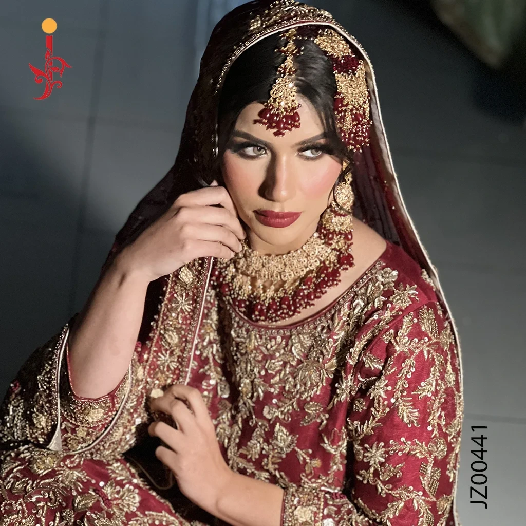 deep-red-bridal-farshi-lehenga-detail.webp Deep Red Farshi Lehenga — Zardozi Embroidery Close-Up