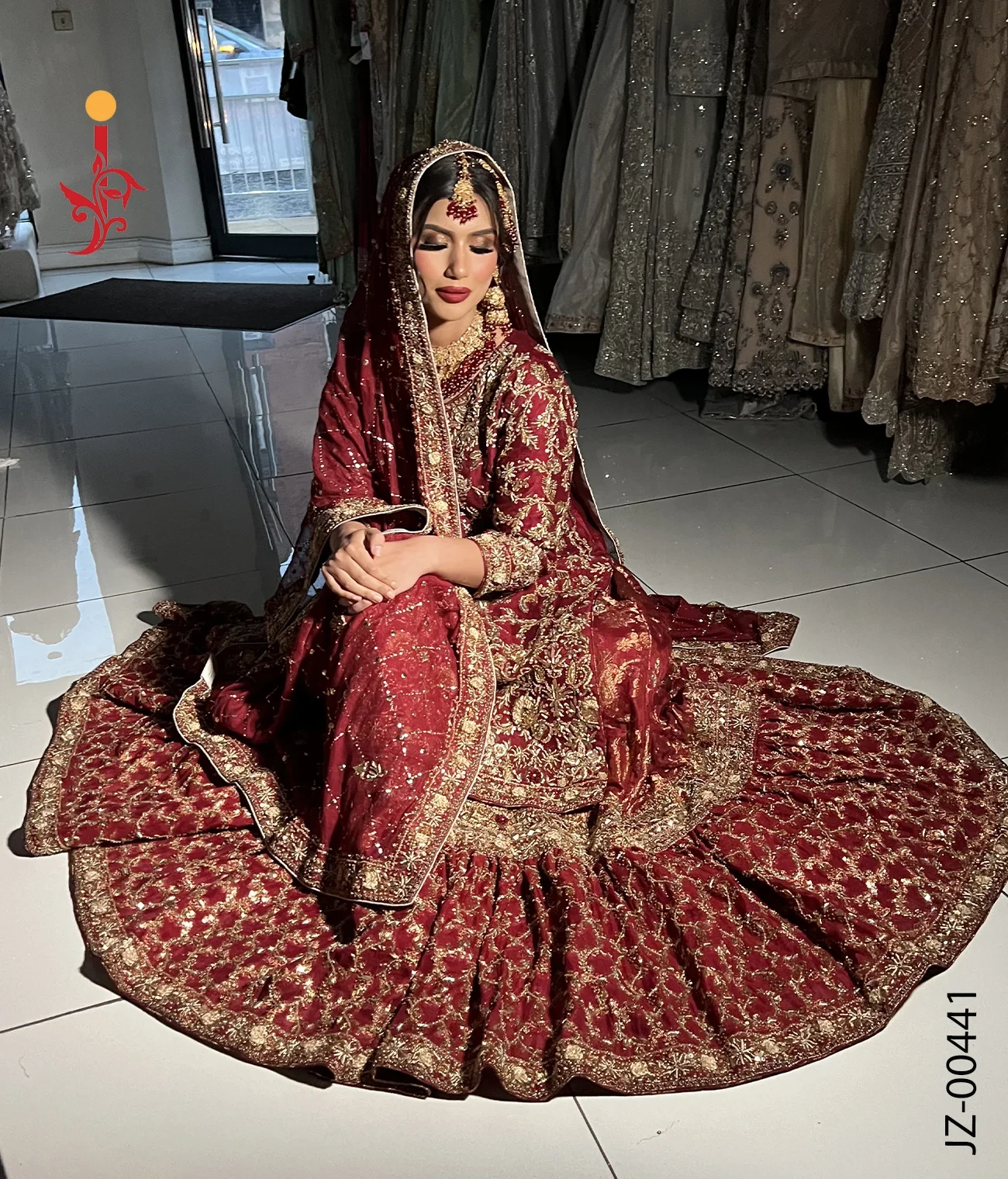 deep-red-bridal-farshi-lehenga-side.webp Deep Red Farshi Lehenga — Side Profile Flared Silhouette