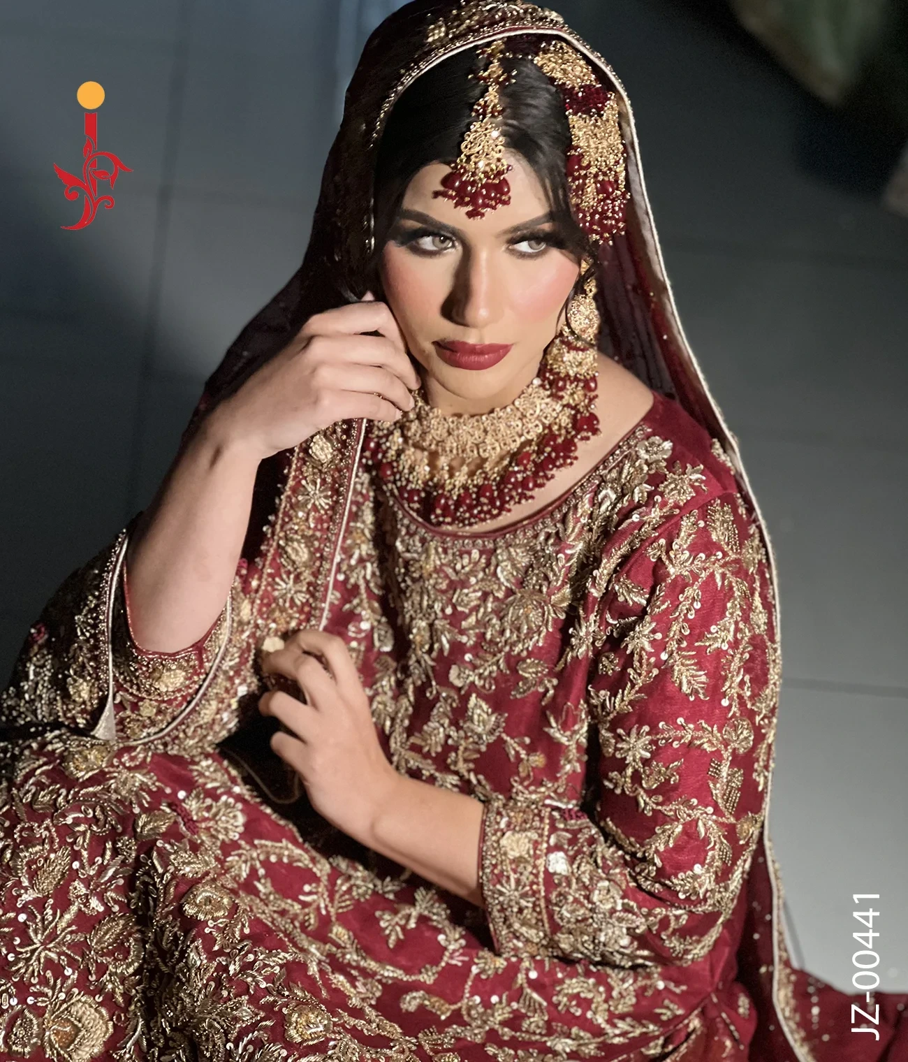deep-red-bridal-farshi-lehenga-back.webp Deep Red Farshi Lehenga — Back View Heavy Embroidery